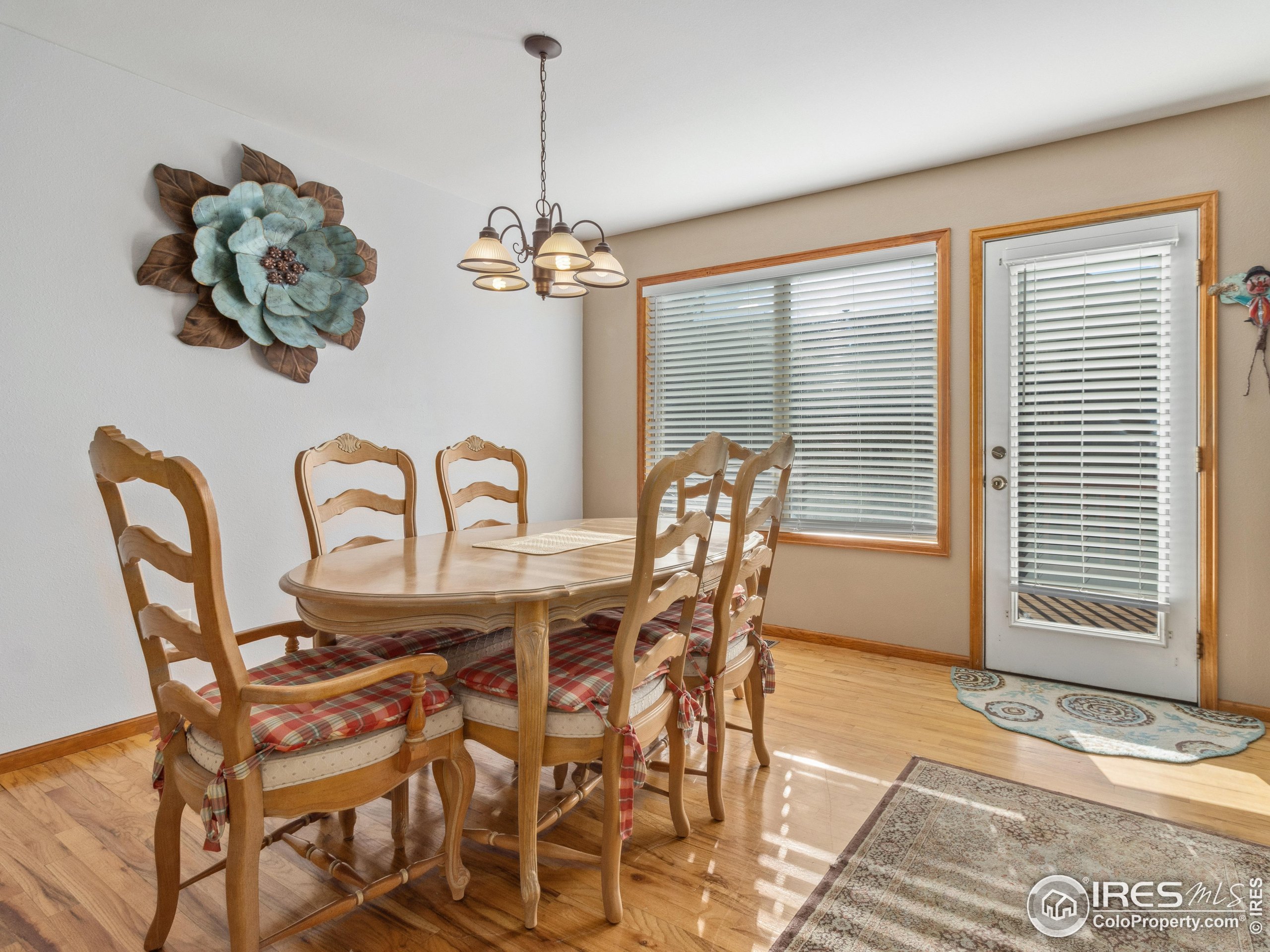 300 Far View Drive, Unit 7 Estes Park, CO 80517 - Photo 7 of 26 a view of a dining room with furniture window and outside view