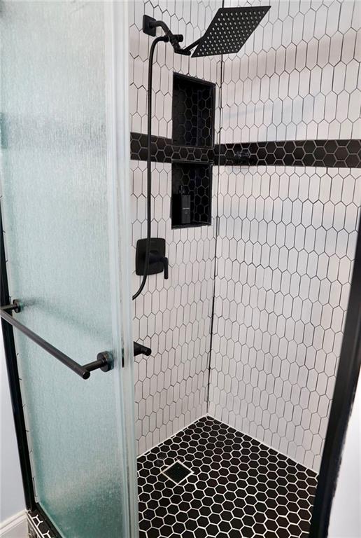 3812 Clovis Court Northwest Atlanta, GA 30331 - Photo 14 of 20 a bathroom with a shower