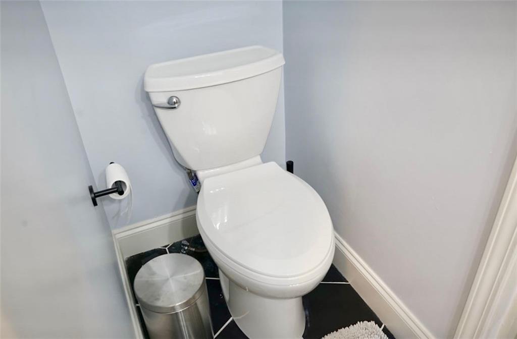 3812 Clovis Court Northwest Atlanta, GA 30331 - Photo 15 of 20 a white toilet sitting next to a sink