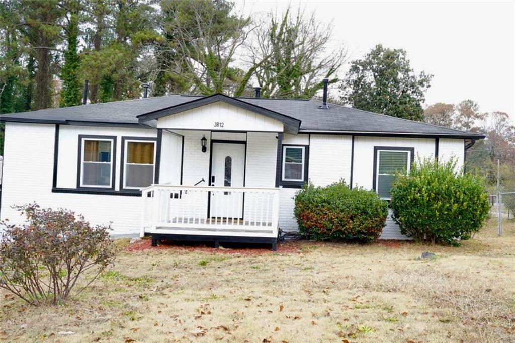 3812 Clovis Court Northwest Atlanta, GA 30331 - Photo 19 of 20 a front view of a house with a yard