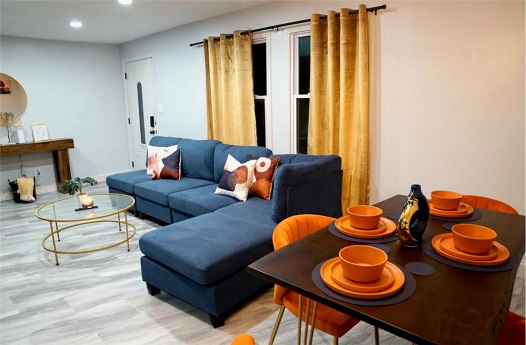 3812 Clovis Court Northwest Atlanta, GA 30331 - Photo 5 of 20 a living room with furniture and wooden floor