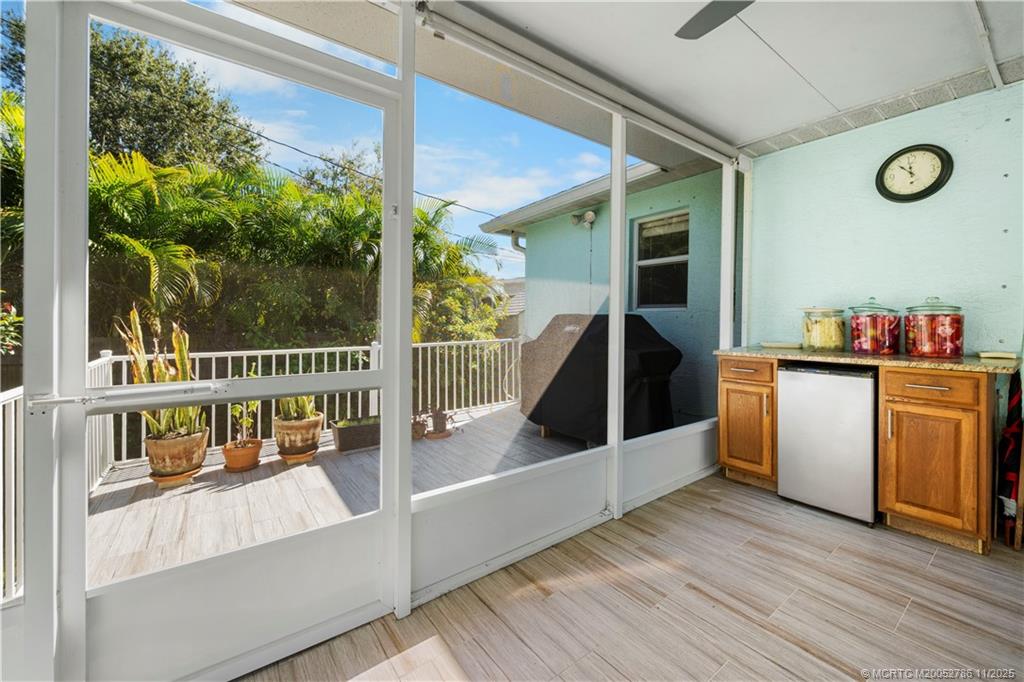 3785 Southeast Middle Street Stuart, FL 34997 - Photo 22 of 31 a view of living room with furniture and wooden floor