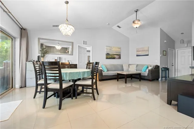 a view of a livingroom with furniture and window