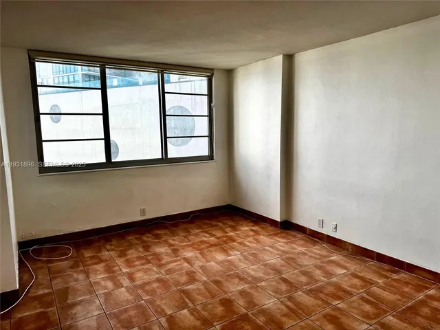 an empty room with a window