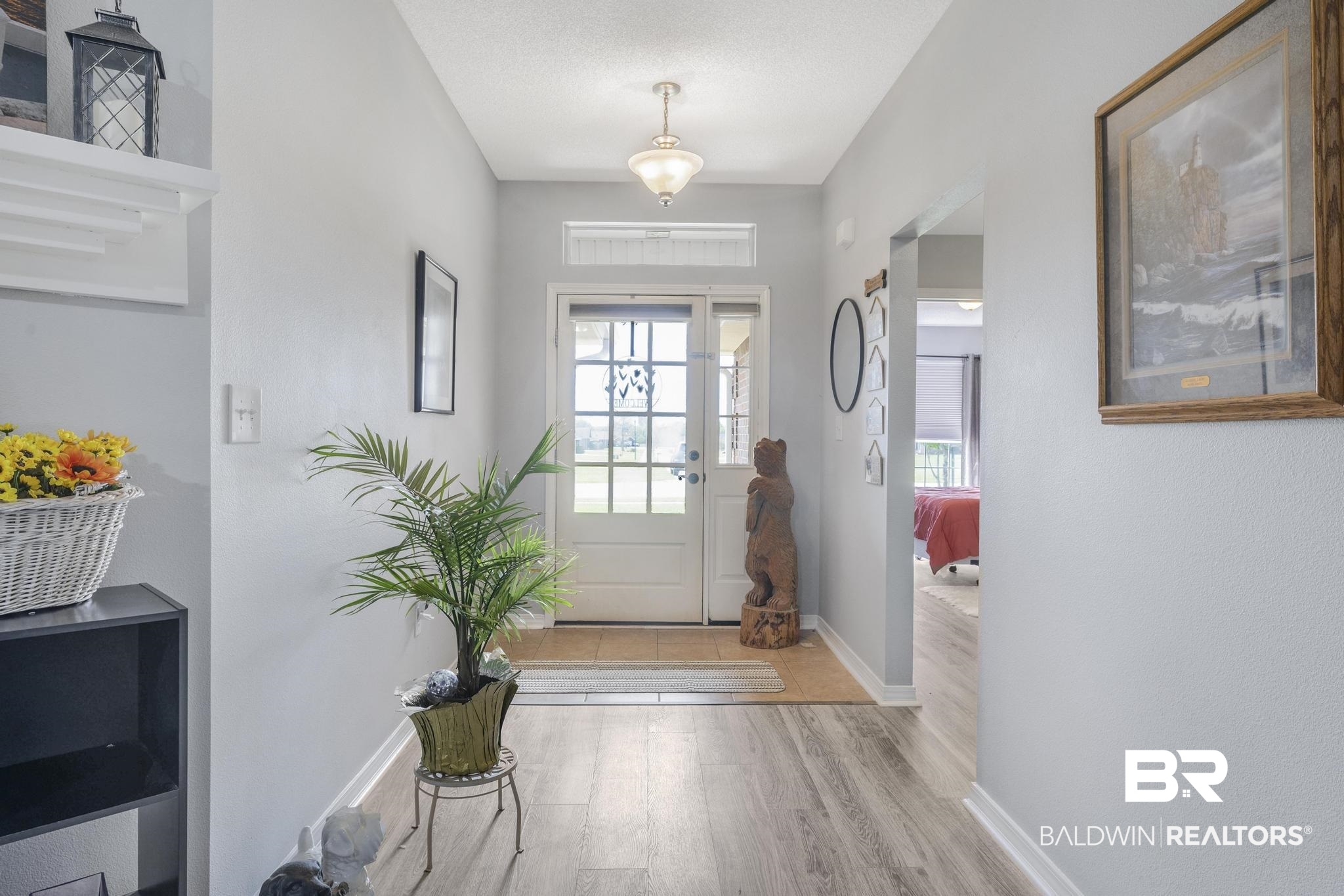 16545 Cold Mill Loop Foley, AL 36535 - Photo 3 of 48 Foyer entrance with baseboards and wood finished floors