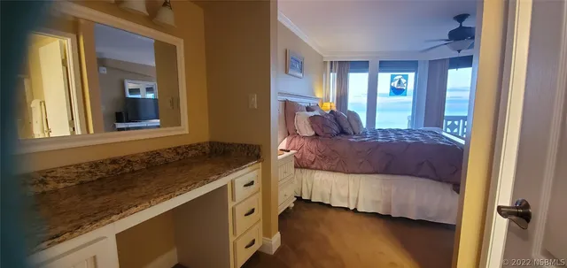 a view of living room with furniture and flat screen tv