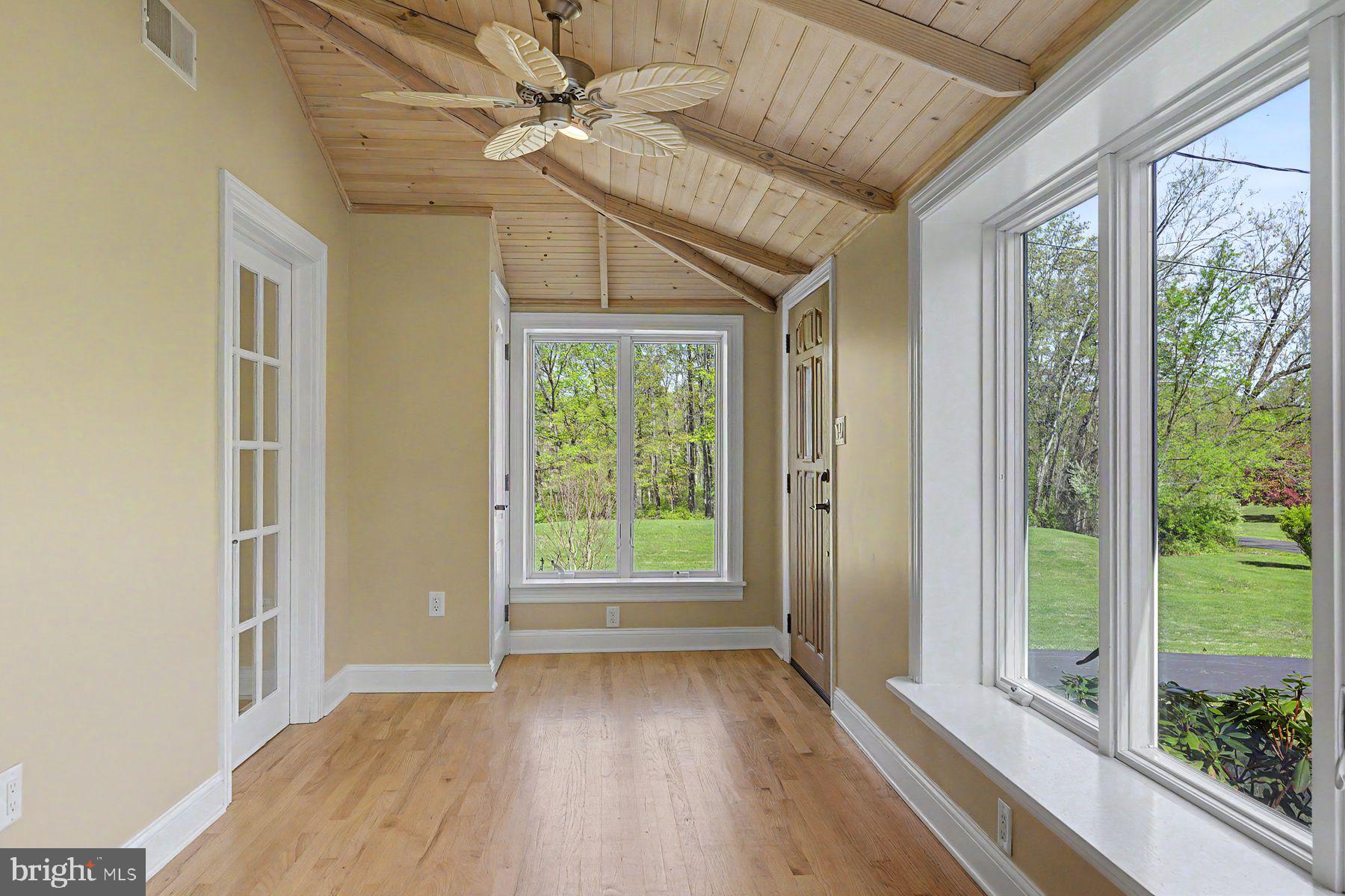 1856 Ringing Rocks Road Upper Black Eddy, PA 18972 - Photo 16 of 49 Bright sunlit room with nature views.