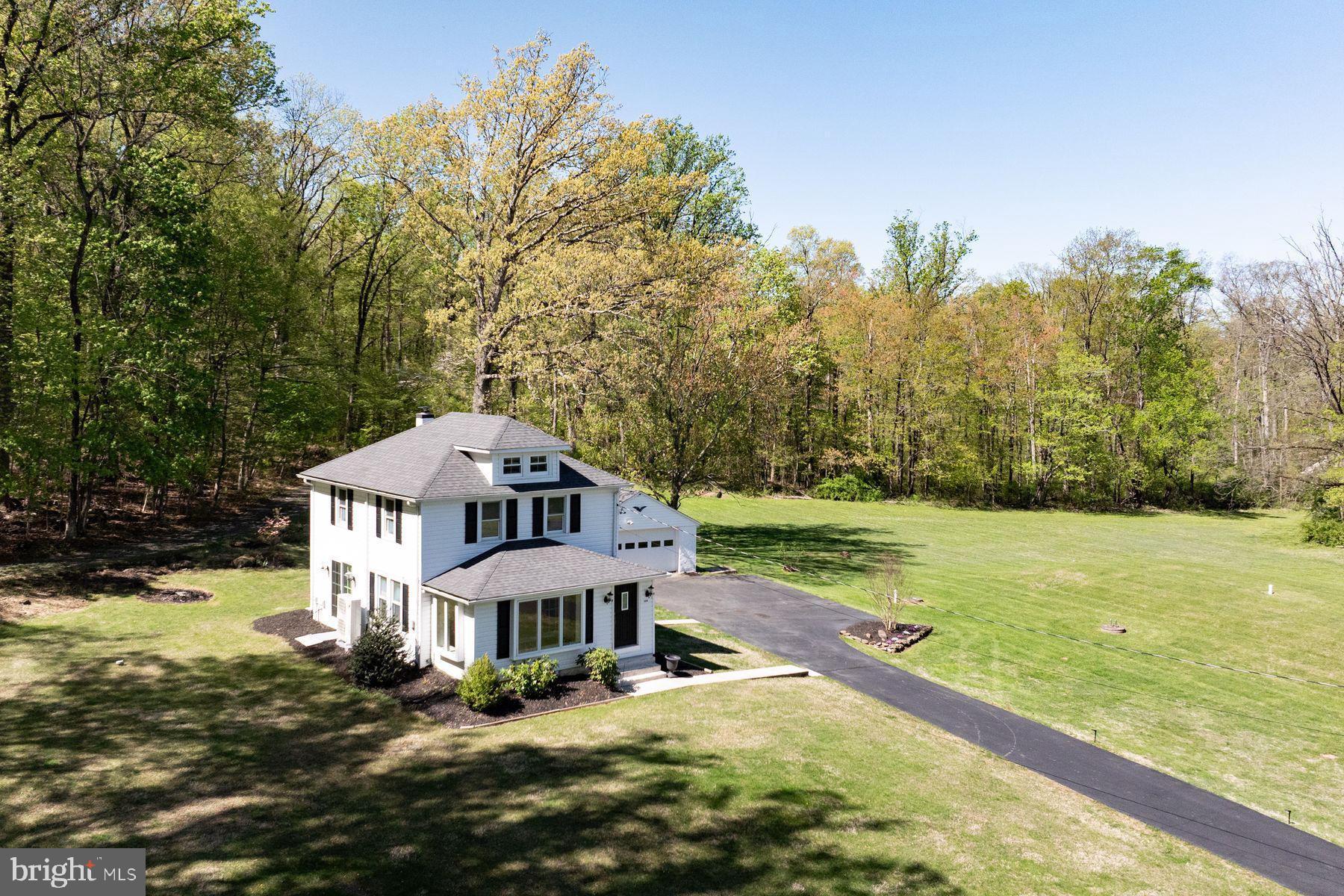 1856 Ringing Rocks Road Upper Black Eddy, PA 18972 - Photo 2 of 49 Charming home embraced by nature.
