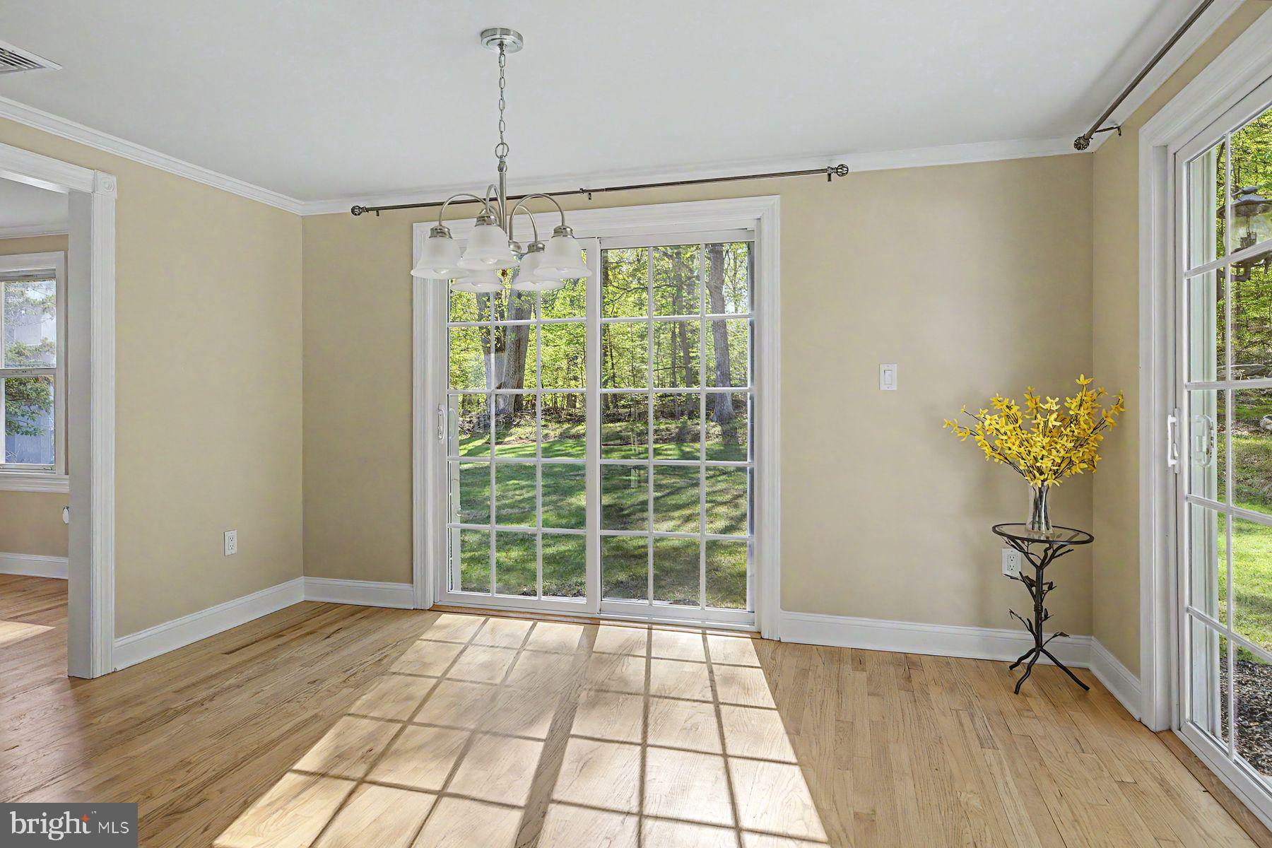 1856 Ringing Rocks Road Upper Black Eddy, PA 18972 - Photo 22 of 49 Sunlit dining space with garden views.