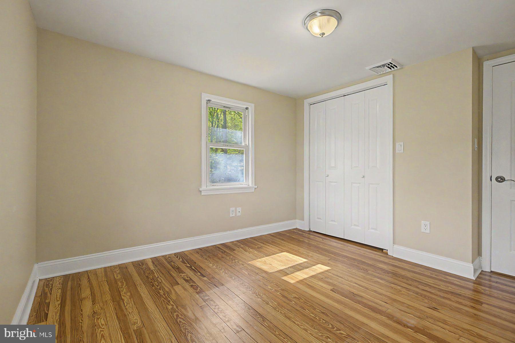1856 Ringing Rocks Road Upper Black Eddy, PA 18972 - Photo 36 of 49 Bright and airy room with hardwood floors.