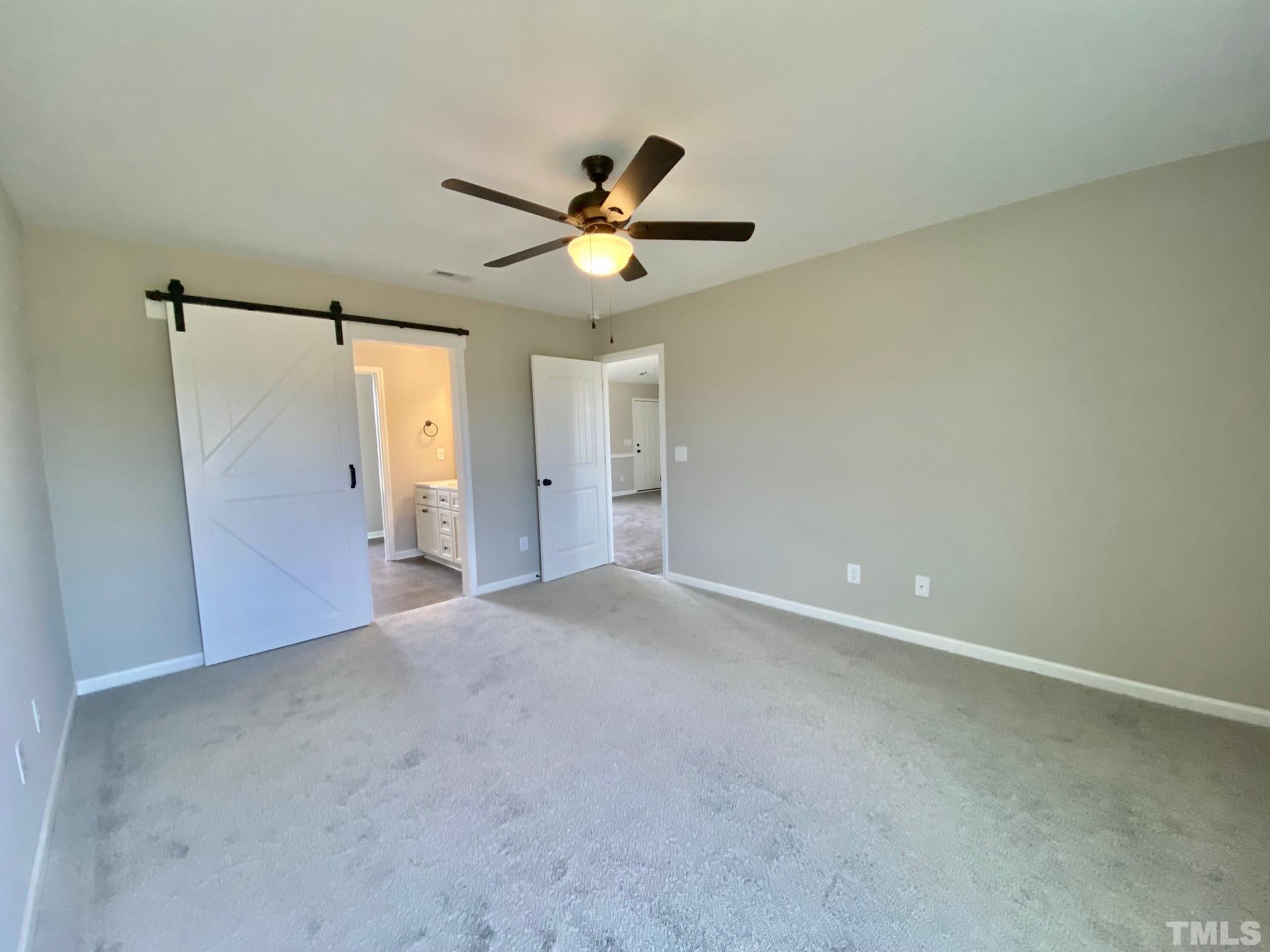 120 Mamie Road Benson, NC 27504 - Photo 22 of 35 a view of an empty room