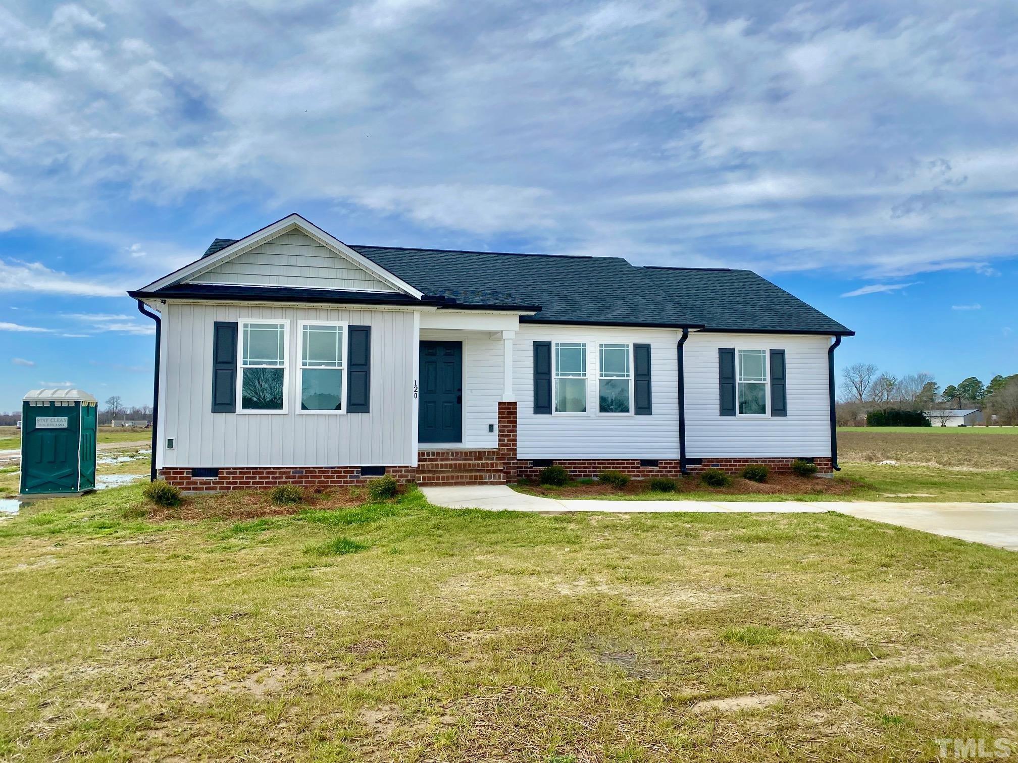 120 Mamie Road Benson, NC 27504 - Photo 3 of 35 a view of a house with a swimming pool