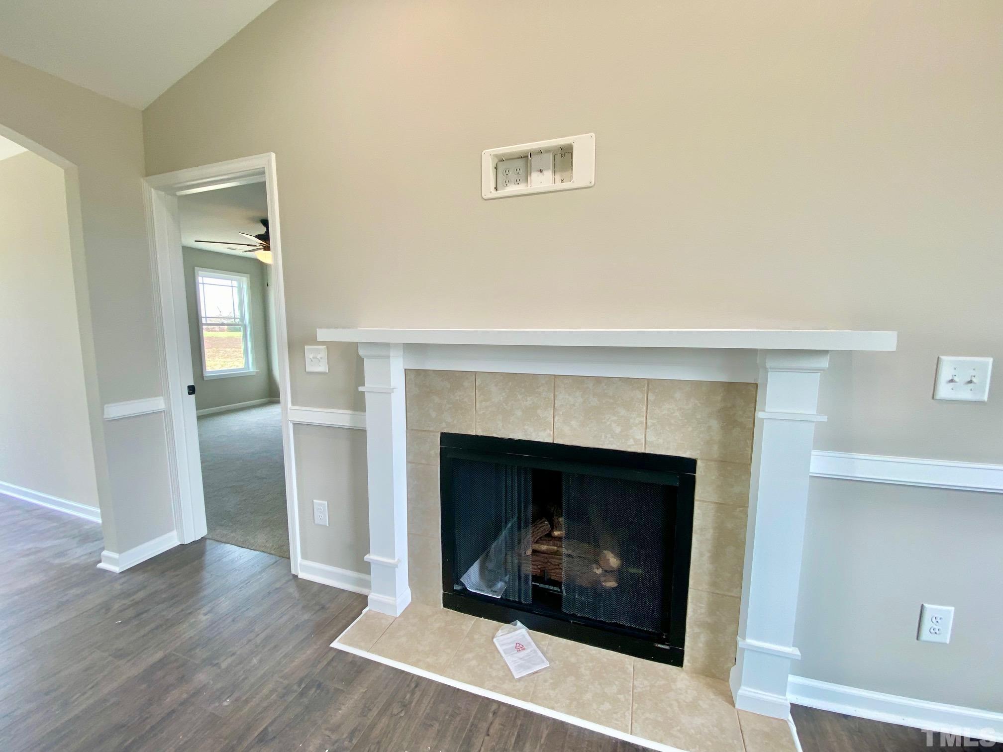 120 Mamie Road Benson, NC 27504 - Photo 9 of 35 a living room with a fireplace