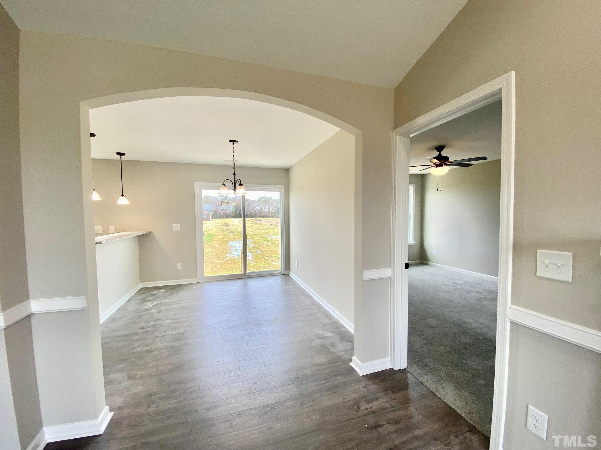 120 Mamie Road Benson, NC 27504 - Photo 10 of 35 a view of an empty room with a window