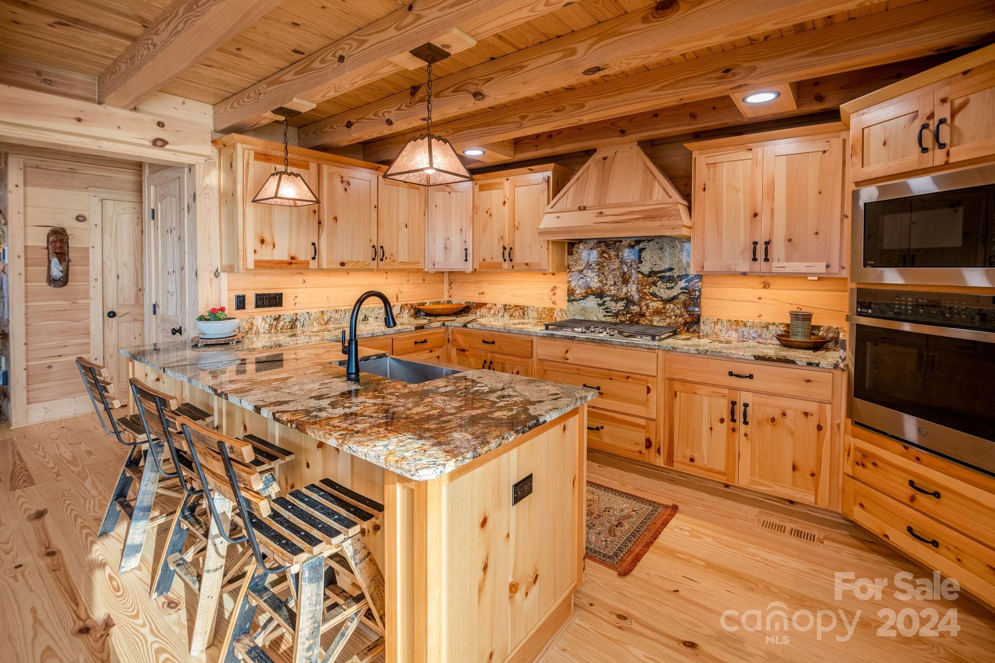 1958 Boxelder Trail Ridgeway, SC 29130 - Photo 13 of 46 a kitchen with stainless steel appliances granite countertop a sink stove and cabinets
