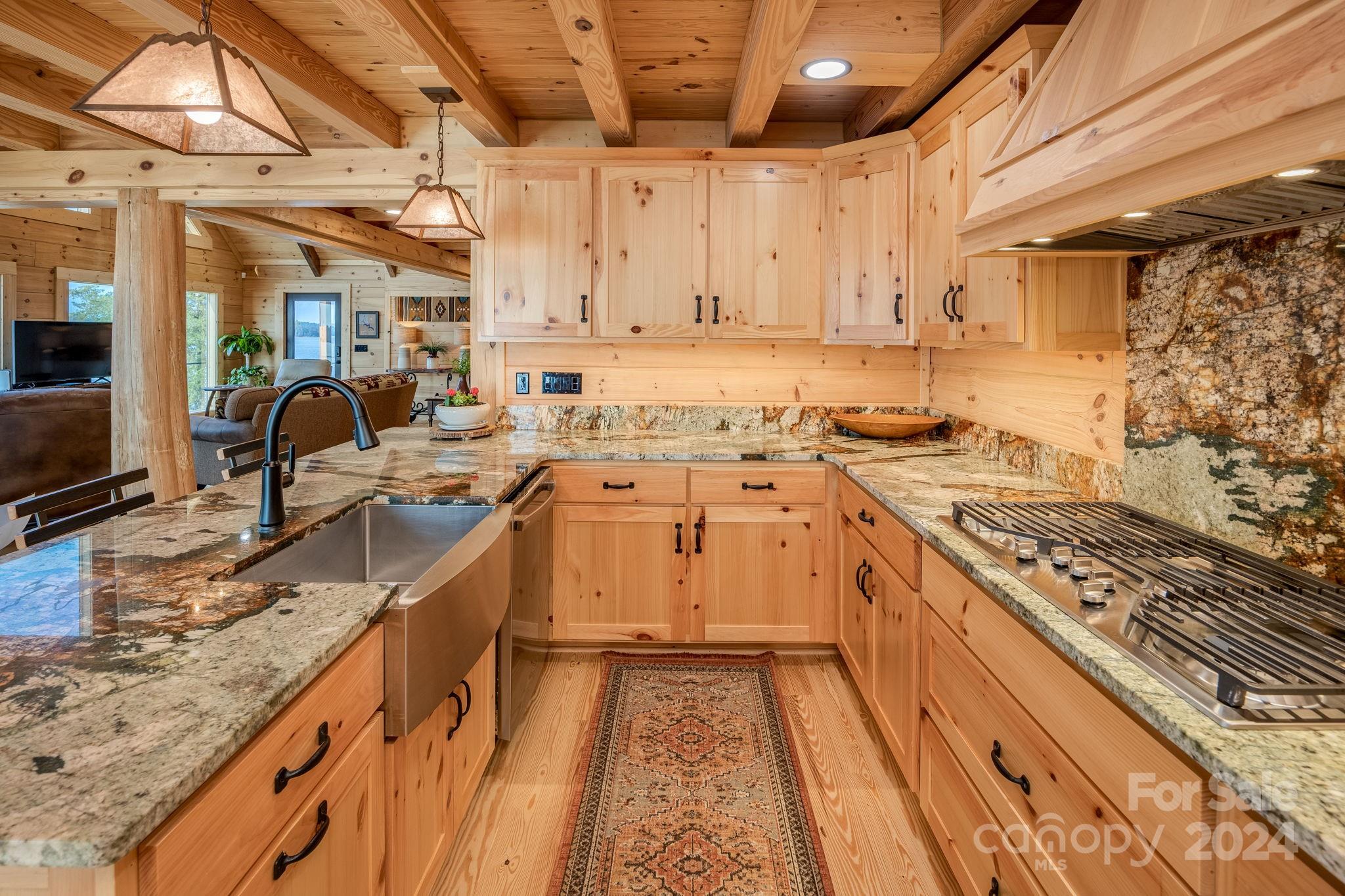 1958 Boxelder Trail Ridgeway, SC 29130 - Photo 15 of 46 a kitchen with a sink stove and cabinets
