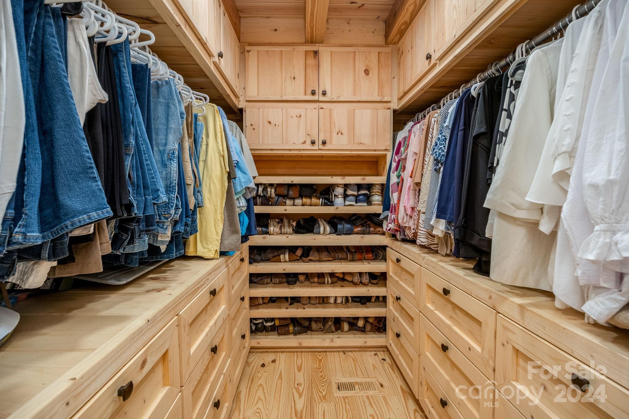 1958 Boxelder Trail Ridgeway, SC 29130 - Photo 23 of 46 a view of walk in closet with clothes and shoes