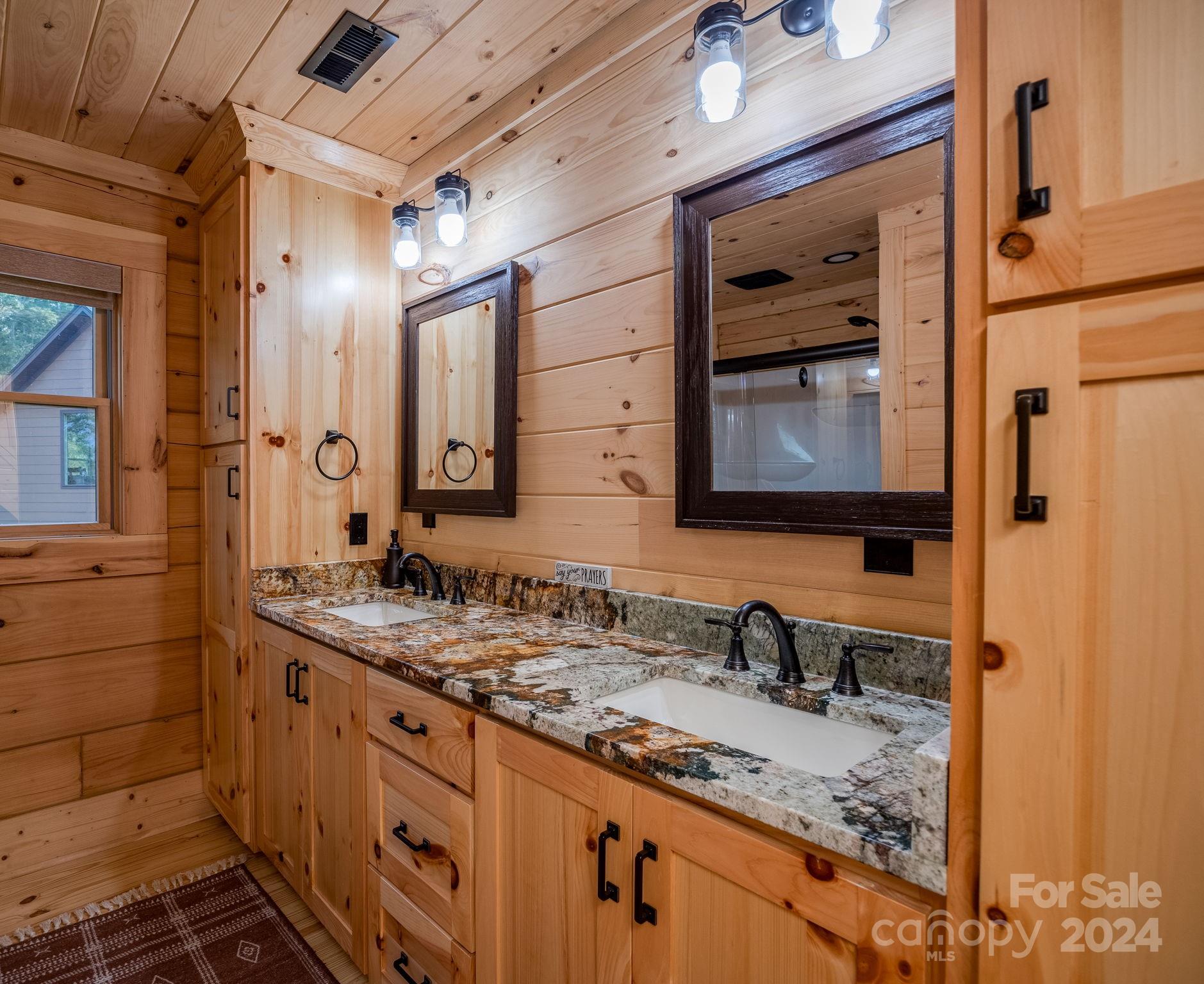 1958 Boxelder Trail Ridgeway, SC 29130 - Photo 29 of 46 a bathroom with a granite countertop sink and a mirror