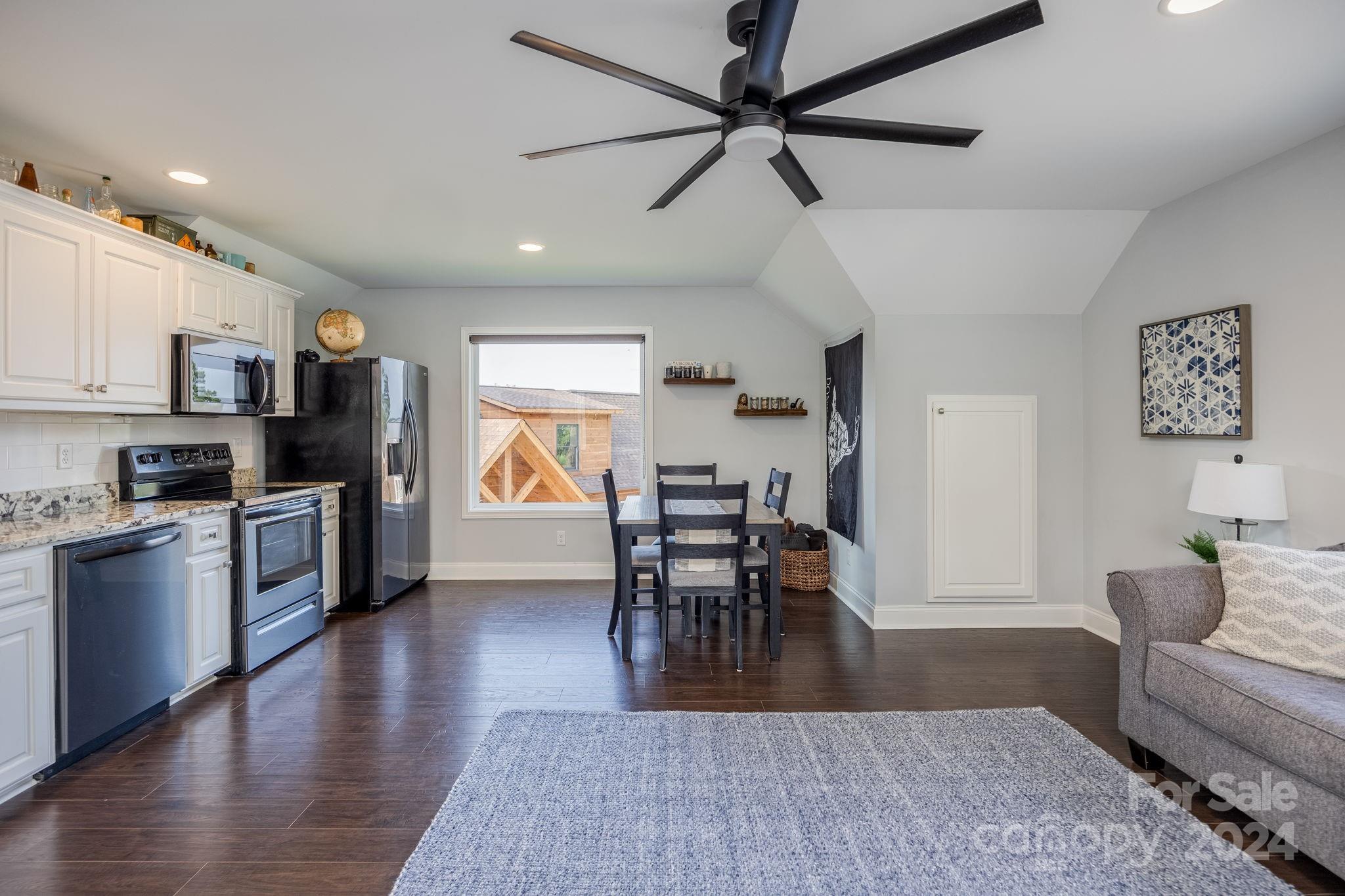 1958 Boxelder Trail Ridgeway, SC 29130 - Photo 39 of 46 a living room with stainless steel appliances furniture wooden floor and a view of kitchen