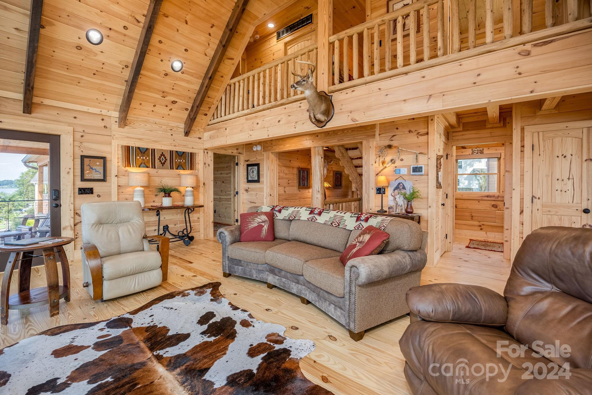 1958 Boxelder Trail Ridgeway, SC 29130 - Photo 10 of 46 a living room with furniture ceiling fan and a rug