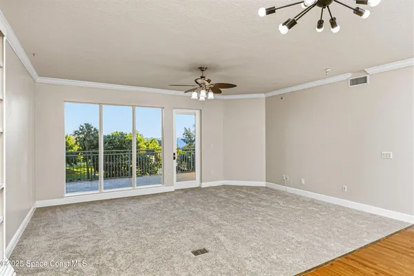 a kitchen with granite countertop a sink and cabinets