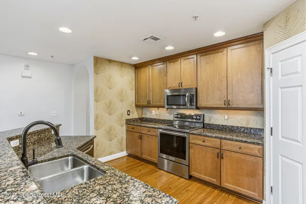 a bathroom with a tub and a sink