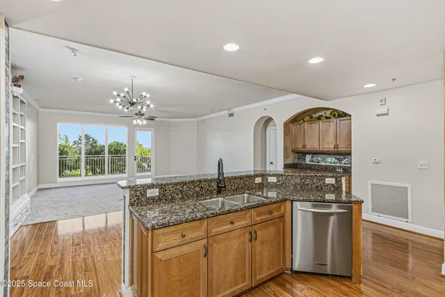 a bathroom with double vanity sink and a mirror