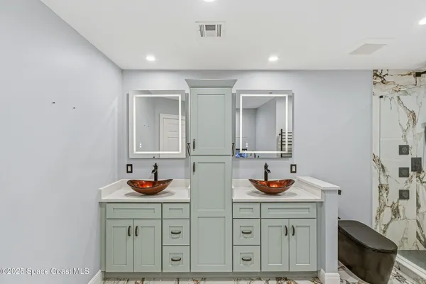 a view of a building with a pathway and a people