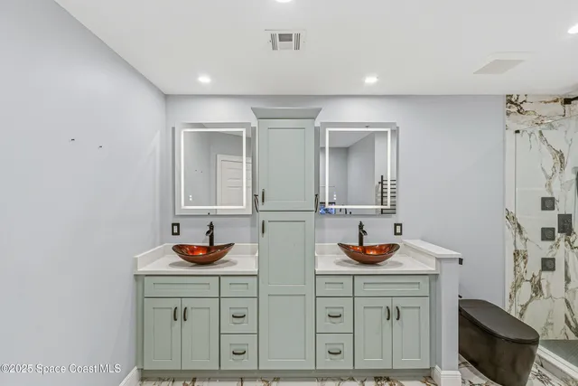 a view of a swimming pool with an ocean view