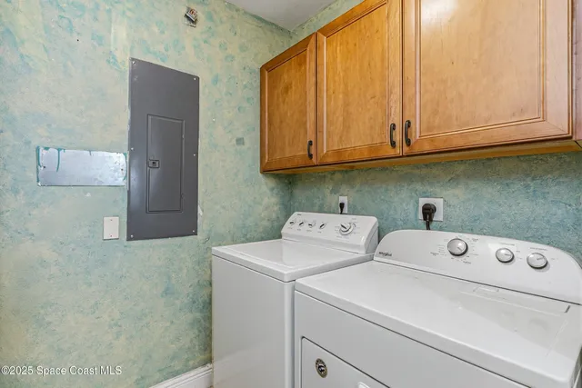 a living room with furniture a dining table and chairs