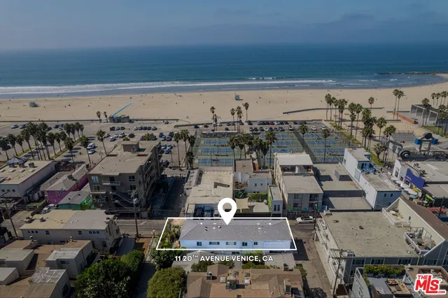 an aerial view of a building with outdoor space