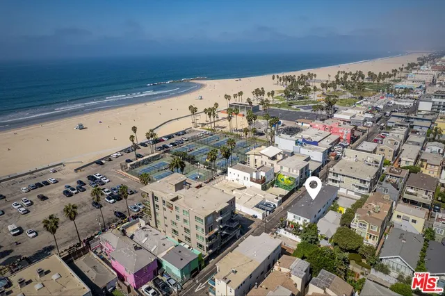 an aerial view of a building with outdoor space