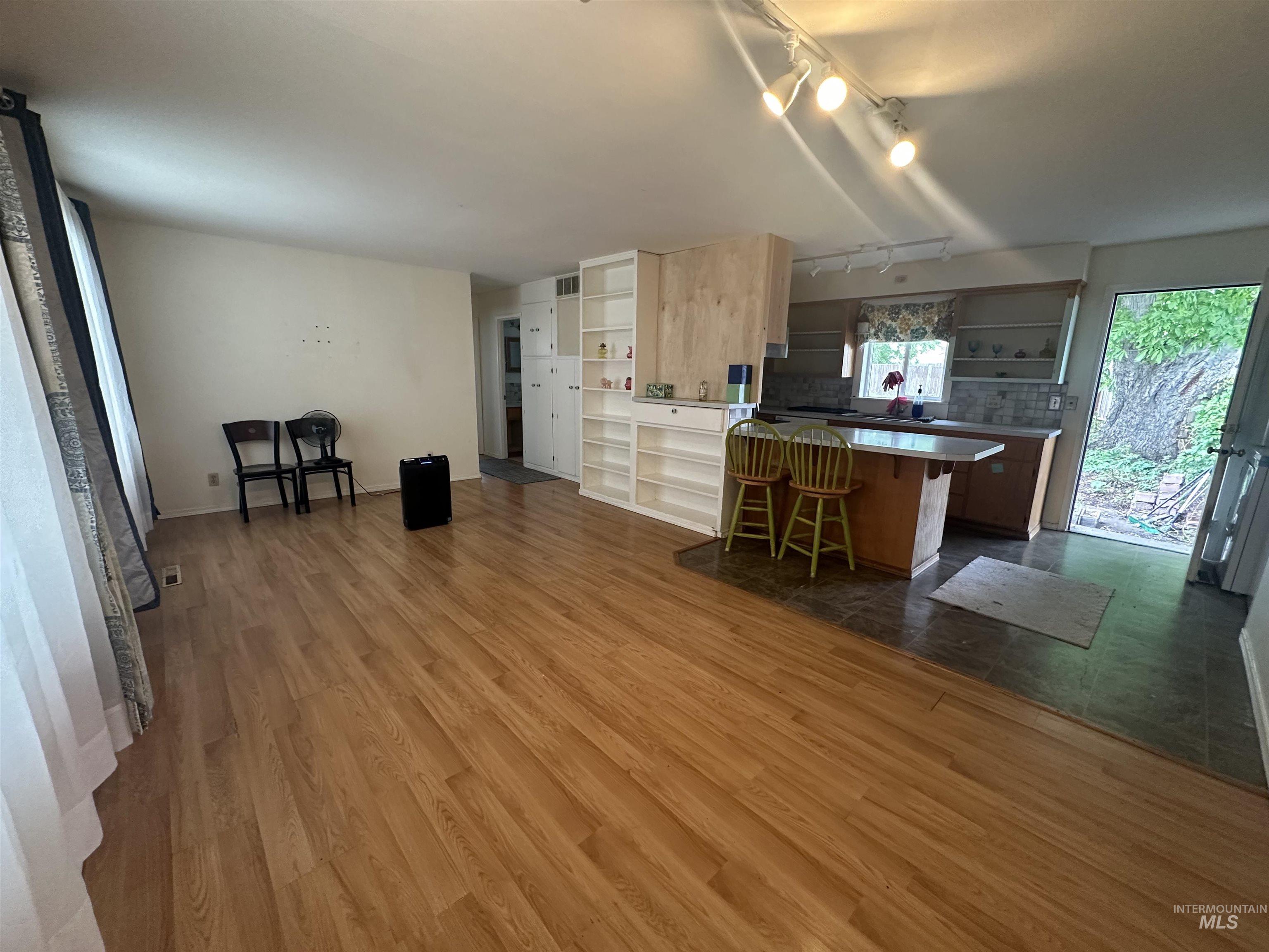 630 Preston Avenue, Unit C Lewiston, ID 83501 - Photo 5 of 10 Open-concept living space featuring wood-finish flooring