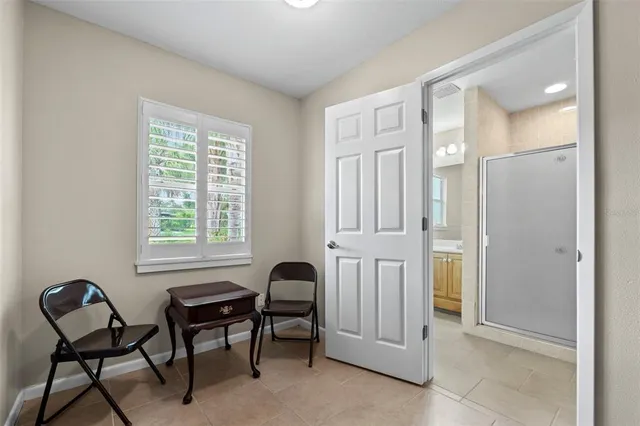 a view of a livingroom with furniture and windows
