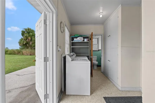 a storage room with a washer and dryer