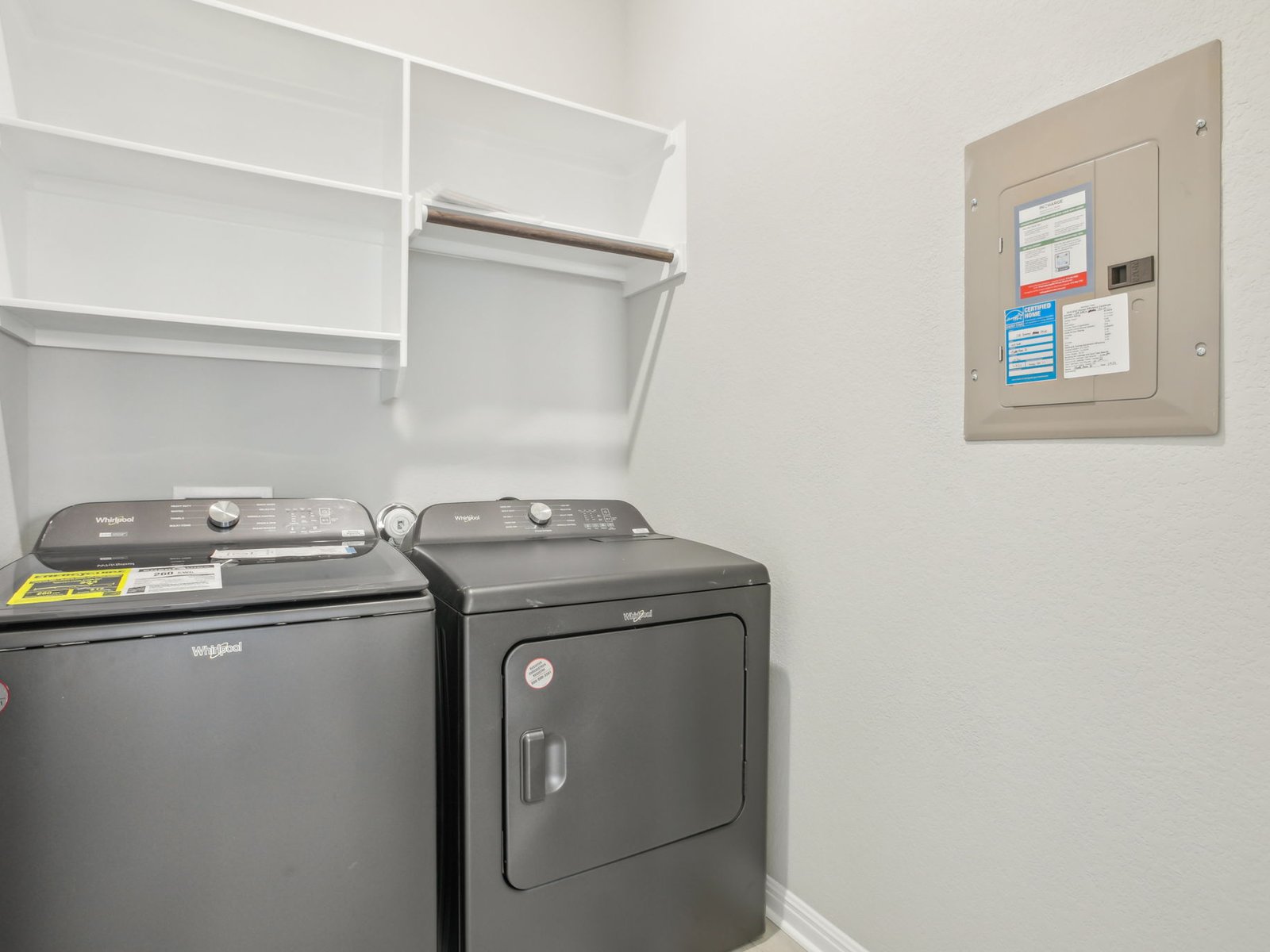 129 Pendleton Drive Kyle, TX 78640 - Photo 9 of 11 a utility room with dryer and washer