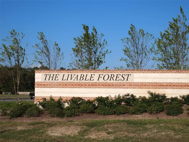 a sign that is on the side of a road