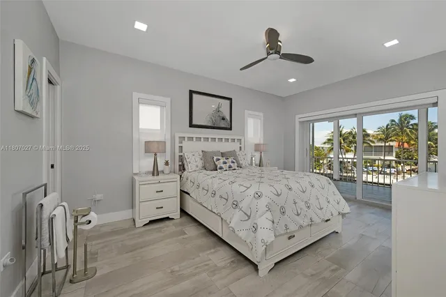 a bed room with a bed and a television