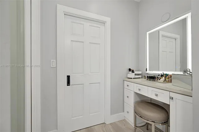 a view of a chairs and table in a balcony