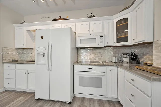 a view of a building with sitting area