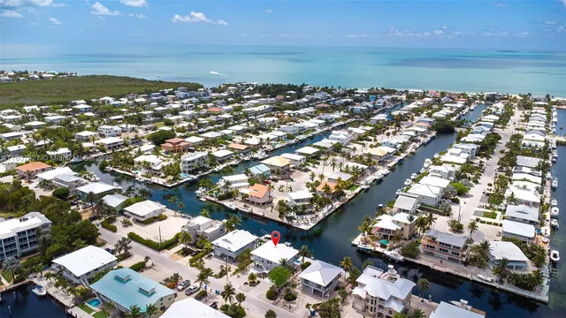 a view of a building with snow on the road
