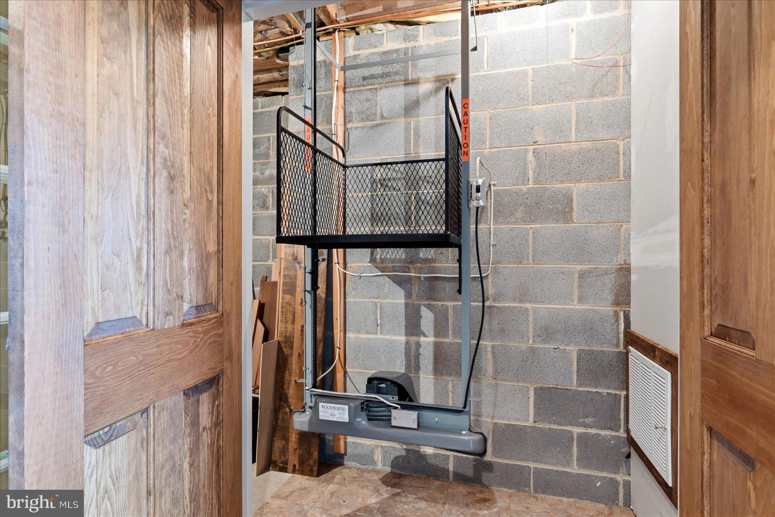 2315 Ritter Drive Yellow Spring, WV 26865 - Photo 39 of 90 wood elevator lower level