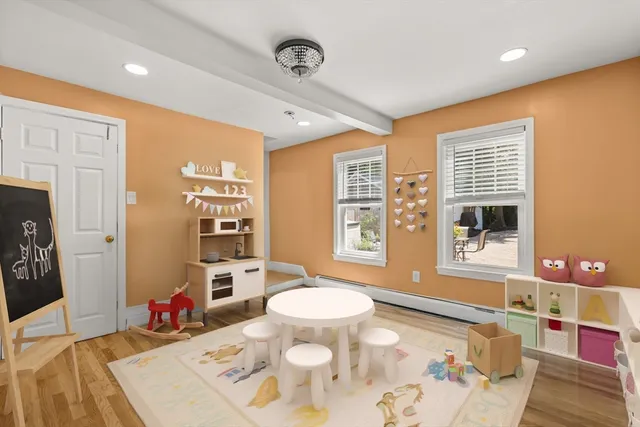 a living room with furniture and a table