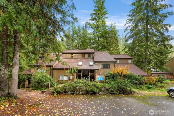front view of a house with a garden