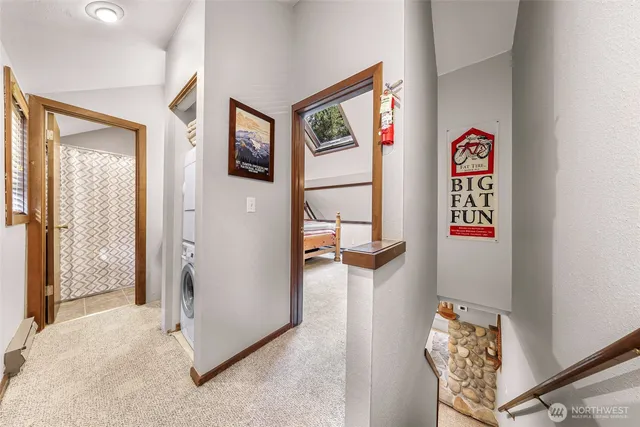 a view of room with window and wooden floor