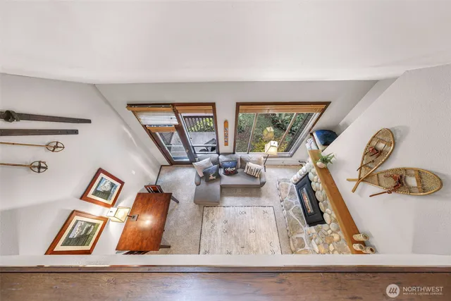 a view of living room with furniture and floor to ceiling window