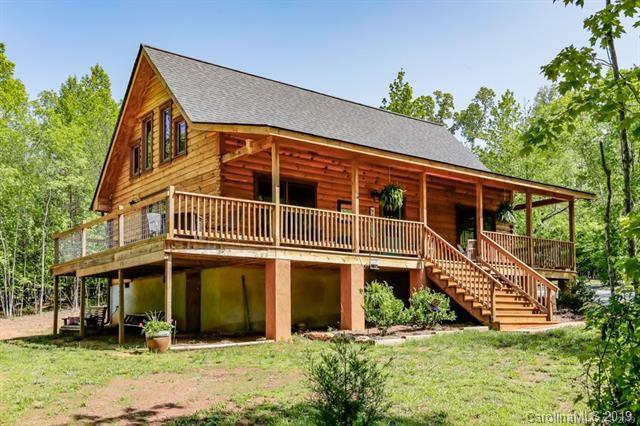 91 Zachary Lane Rutherfordton, NC 28139 - Photo 2 of 37 a front view of a house with a yard