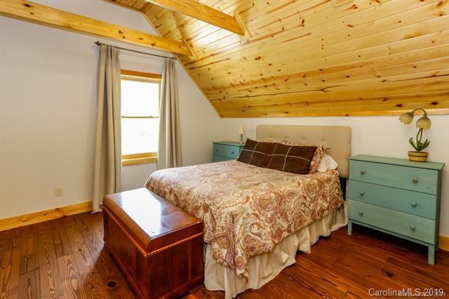 91 Zachary Lane Rutherfordton, NC 28139 - Photo 22 of 37 a bedroom with a bed and a window