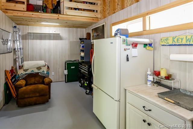 91 Zachary Lane Rutherfordton, NC 28139 - Photo 27 of 37 a utility room with refrigerator and washer