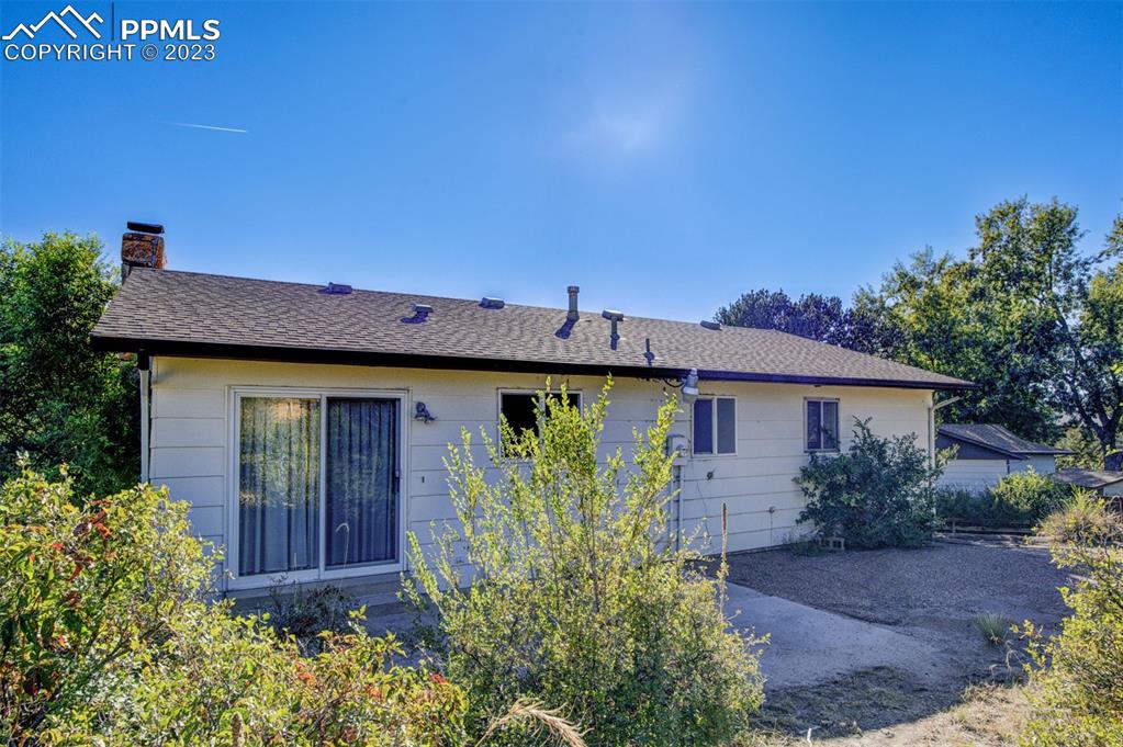 5380 Babcock Court Colorado Springs, CO 80915 - Photo 21 of 28 front view of a house with potted plants